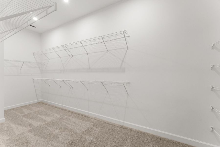 Spacious, unfurnished interior of a new home in Tradition - Telaro, Port St. Lucie (Image 10).