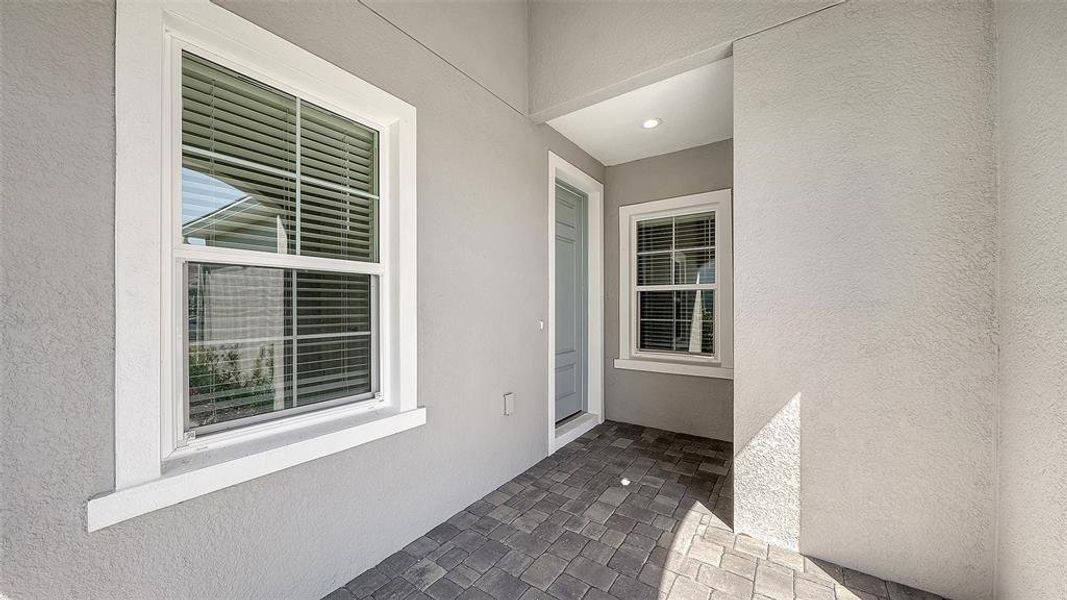 Exterior details and patio area of a home in Palm Grove, Lakewood Ranch (Image 29).
