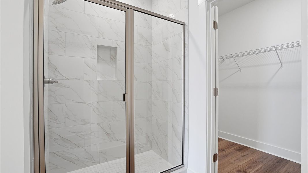 First-rate primary bathroom offering an elegant walk-in shower with superior style located near Downtown Anderson First-rate primary bathroom offering an elegant walk-in shower with superior style located near Downtown Anderson