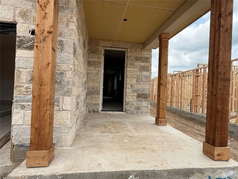 Exterior details and patio area of a home in Lariat, Liberty Hill (Image 3).