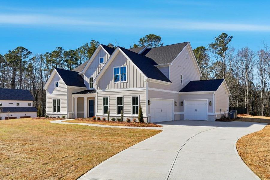 Front exterior of a new home in , Marietta, GA, highlighting curb appeal (Image 25).