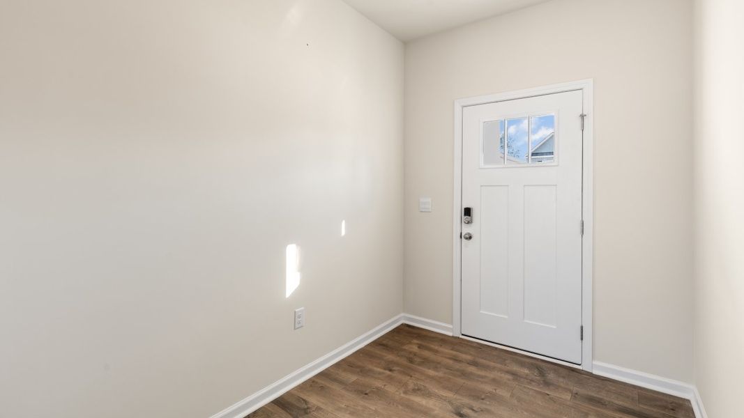 Spacious, unfurnished interior of a new home in The Grove at Matthews Landing, Fuquay Varina (Image 12).