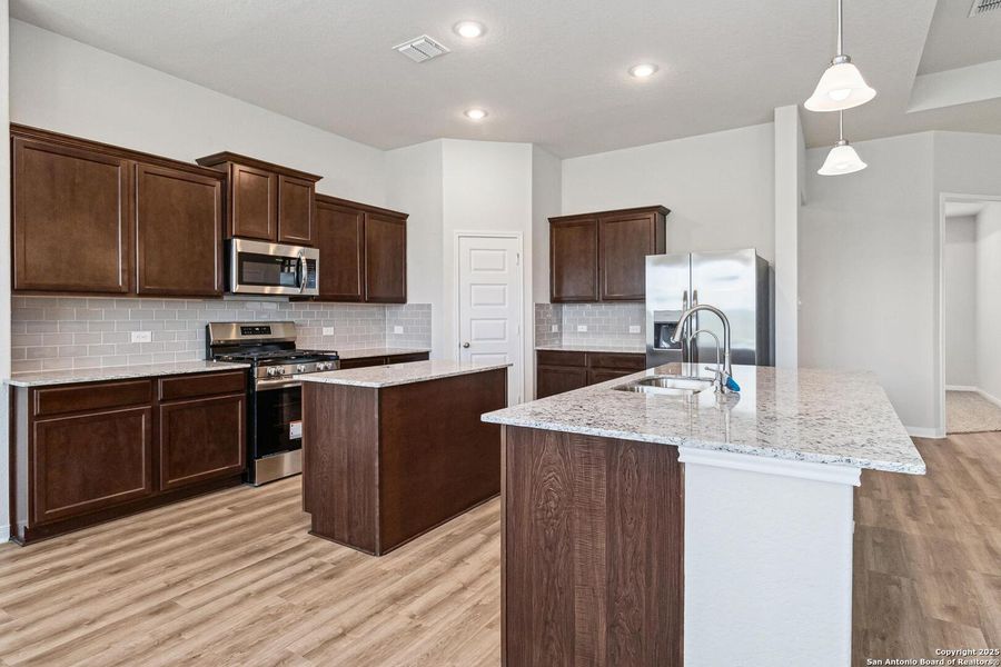 Furnished interior view inside a new home in Lonesome Dove, San Antonio (Image 8). Furnished interior view inside a new home in Lonesome Dove, San Antonio (Image 8).