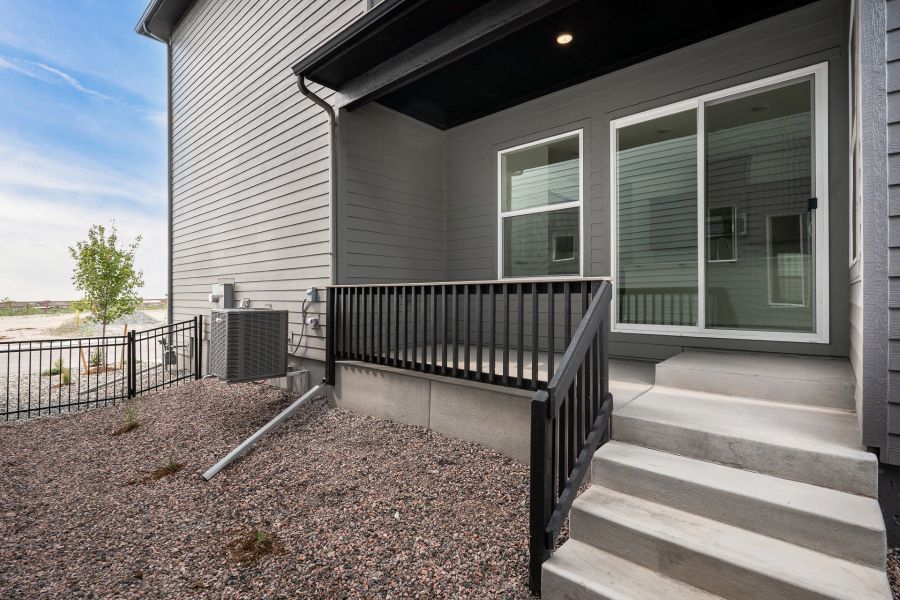 Exterior details and patio area of a home in Elevate at Wolf Ranch, Colorado Springs (Image 3).