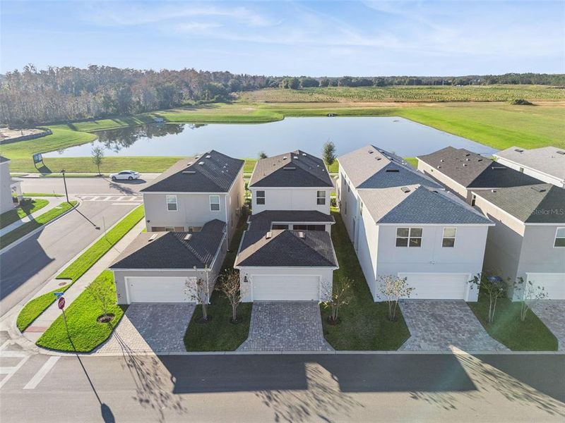 Front exterior of a new home in , Winter Garden, FL, highlighting curb appeal (Image 34).