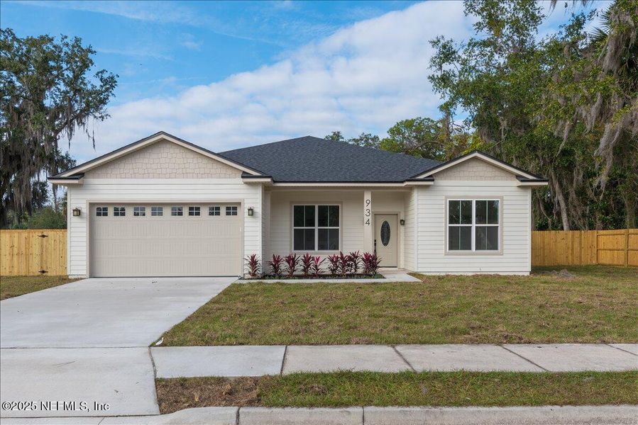 Front exterior of a new home in , Orange Park, FL, highlighting curb appeal (Image 25).
