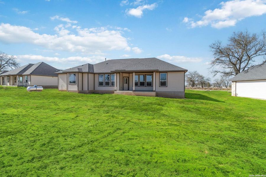 Exterior details and patio area of a home in Lonesome Dove, San Antonio (Image 3).