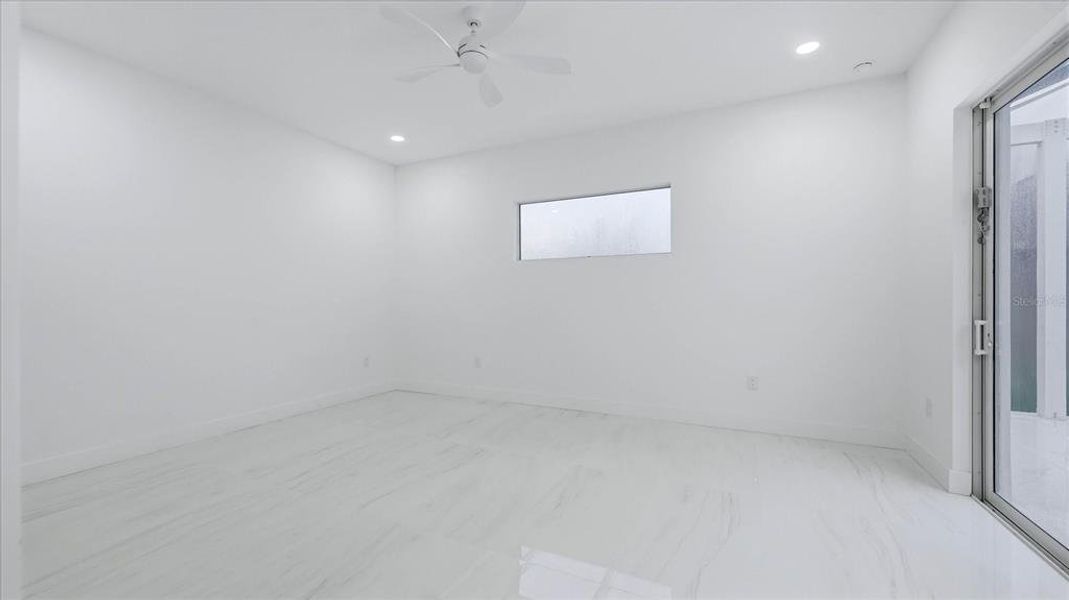Spacious, unfurnished interior of a new home in , Port Charlotte (Image 19).