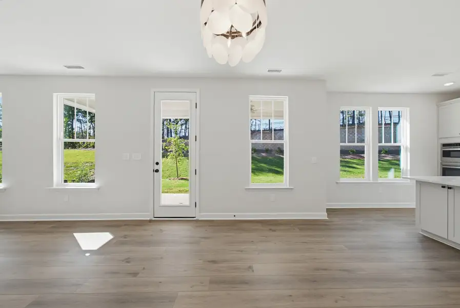 Spacious, unfurnished interior of a new home in Sweetbrier, Durham (Image 24).