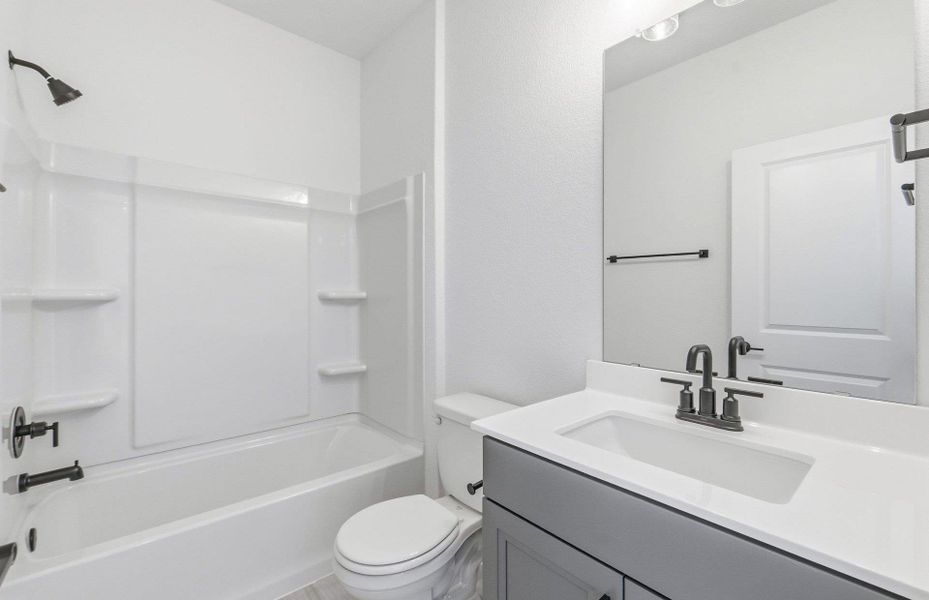 Furnished interior view inside a new home in Cameron Place, Manor (Image 5).