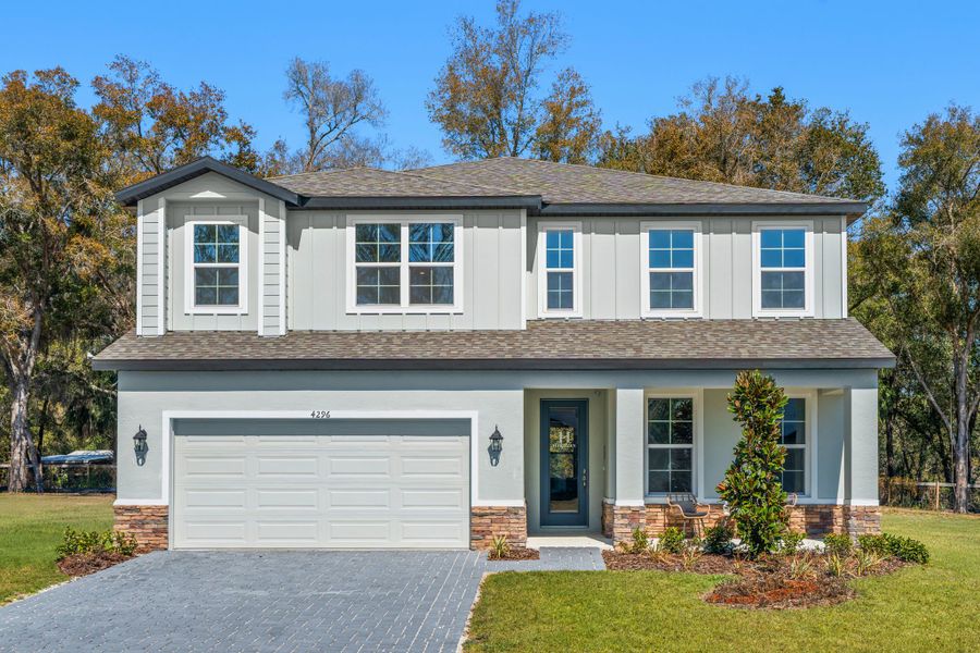 Representative exterior photo of a completed home built from the Guinevere by Hartizen Homes in Estes Reserve, Eustis, FL (Image 17).
