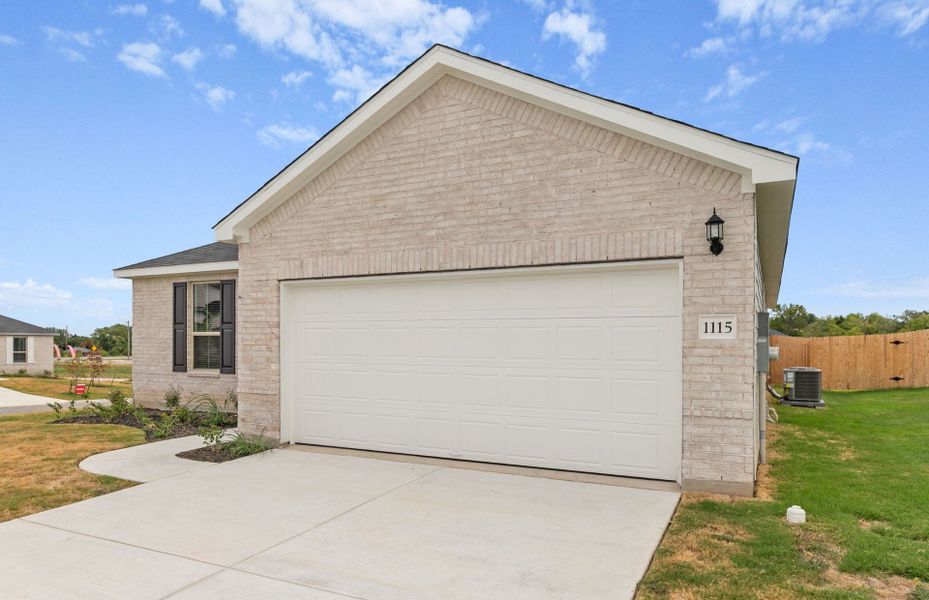 Front exterior of a new home in County View, Temple, TX, highlighting curb appeal (Image 20). Front exterior of a new home in County View, Temple, TX, highlighting curb appeal (Image 20).