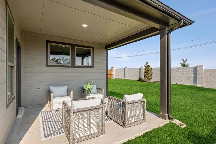 Covered Patio in the Wimbledon home plan by Trophy Signature Homes – REPRESENTATIVE PHOTO Covered Patio in the Wimbledon home plan by Trophy Signature Homes – REPRESENTATIVE PHOTO