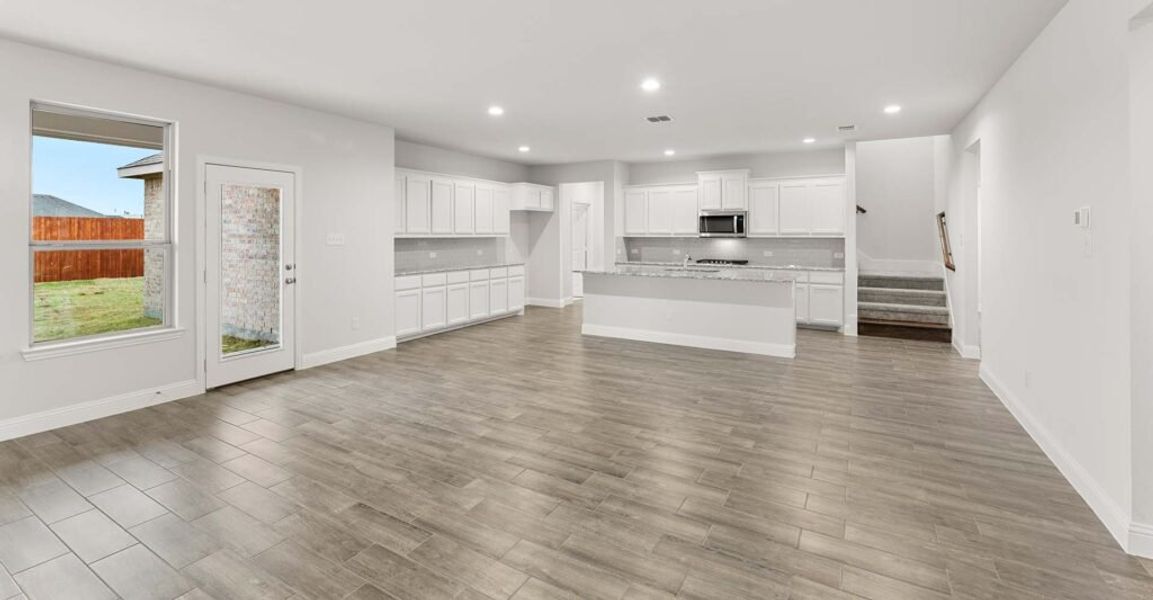 Representative exterior photo of a completed home built from the Thornbury by Impression Homes in Still Water Lake, Godley, TX (Image 7). Representative exterior photo of a completed home built from the Thornbury by Impression Homes in Still Water Lake, Godley, TX (Image 7).