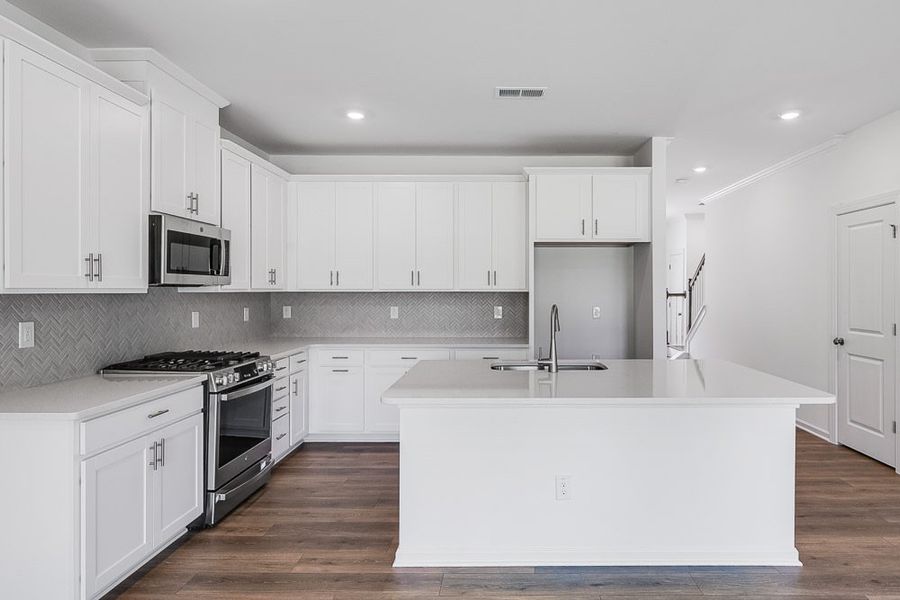 Furnished interior view inside a new home in Forestville Station, Wake Forest (Image 4). Furnished interior view inside a new home in Forestville Station, Wake Forest (Image 4).