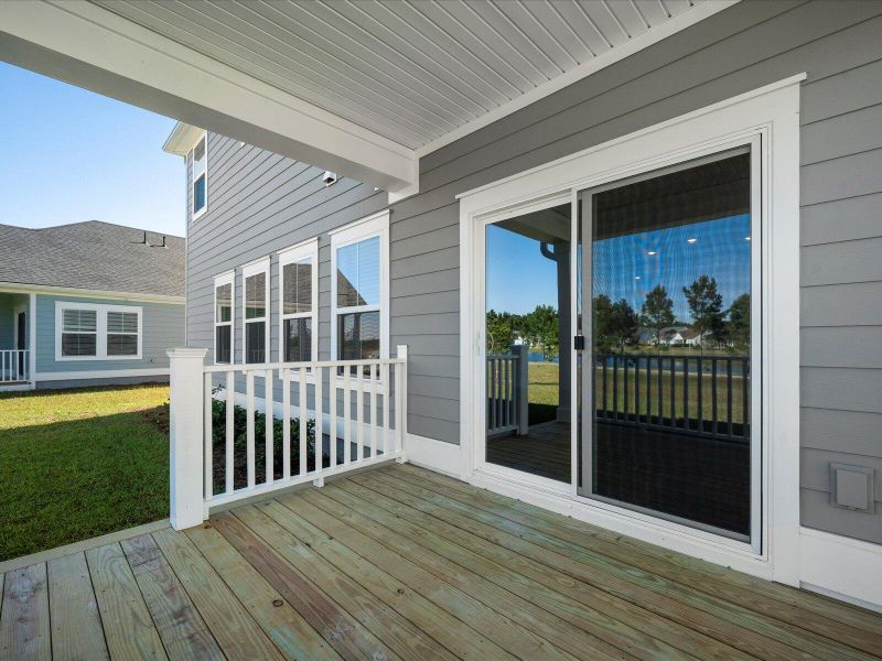 Exterior details and patio area of a home in The Coves at Lakes of Cane Bay, Summerville (Image 24).
