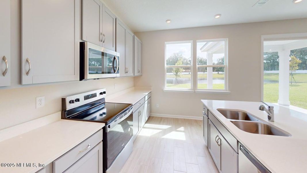 Furnished interior view inside a new home in Sandridge Hills, Green Cove Springs (Image 7).