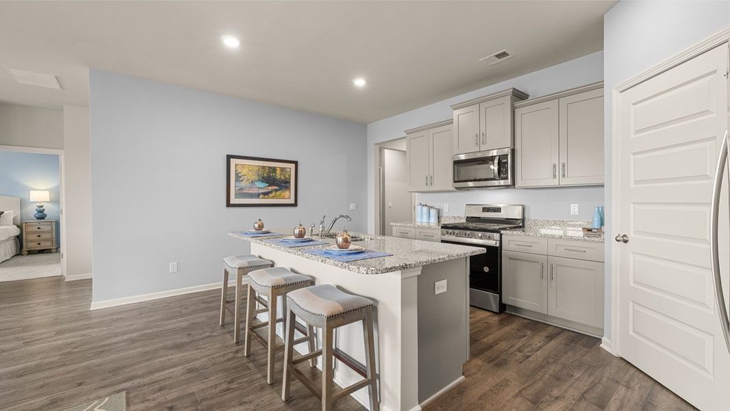 Representative furnished interior of a home built from the Cali by D.R. Horton in Highland Hills, Graniteville (Image 6).