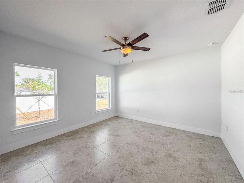 Spacious, unfurnished interior of a new home in , Port Charlotte (Image 17).