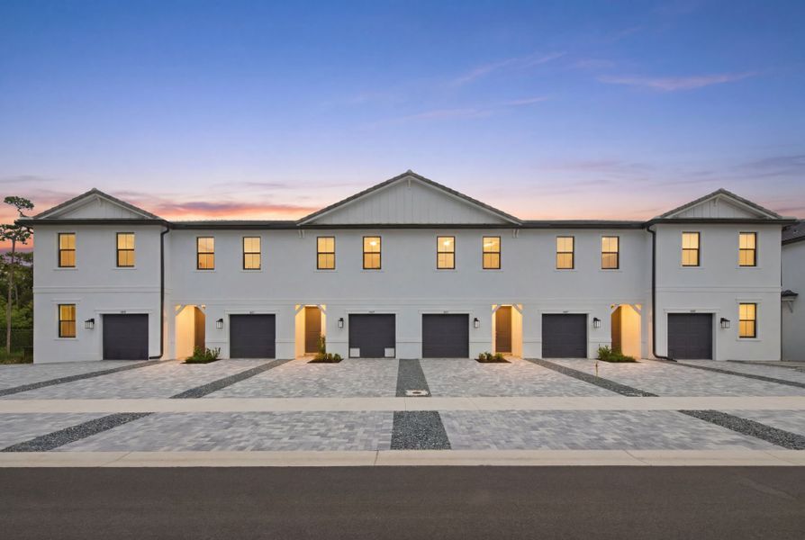 Front exterior of a new home in Everton, Lantana, FL, highlighting curb appeal (Image 19).