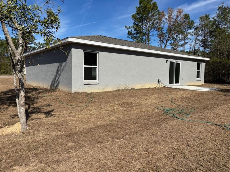 Exterior details and patio area of a home in , Citrus Springs (Image 3).
