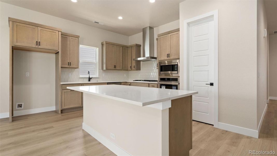 Furnished interior view inside a new home in Pelican Shores at Water Valley, Windsor (Image 10).