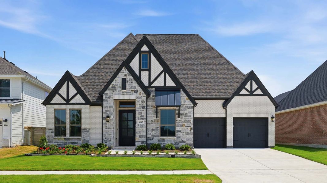 Front exterior of a new home in Landmark, Denton, TX, highlighting curb appeal (Image 1). Front exterior of a new home in Landmark, Denton, TX, highlighting curb appeal (Image 1).