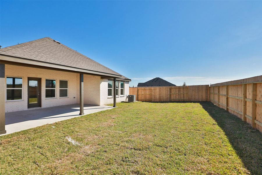 Exterior details and patio area of a home in River Ranch, Dayton (Image 3). Exterior details and patio area of a home in River Ranch, Dayton (Image 3).