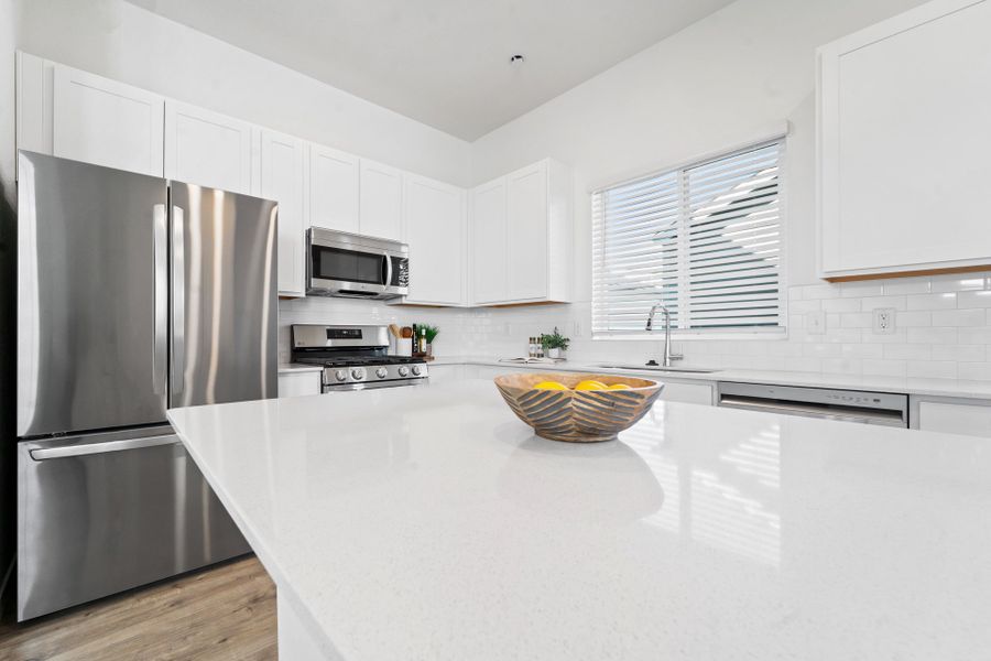 Representative exterior photo of a completed home built from the Telluride by Baessler Homes in Liberty Draw, Evans, CO (Image 42).
