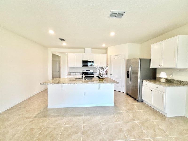 Furnished interior view inside a new home in Cascades, Davenport (Image 6).
