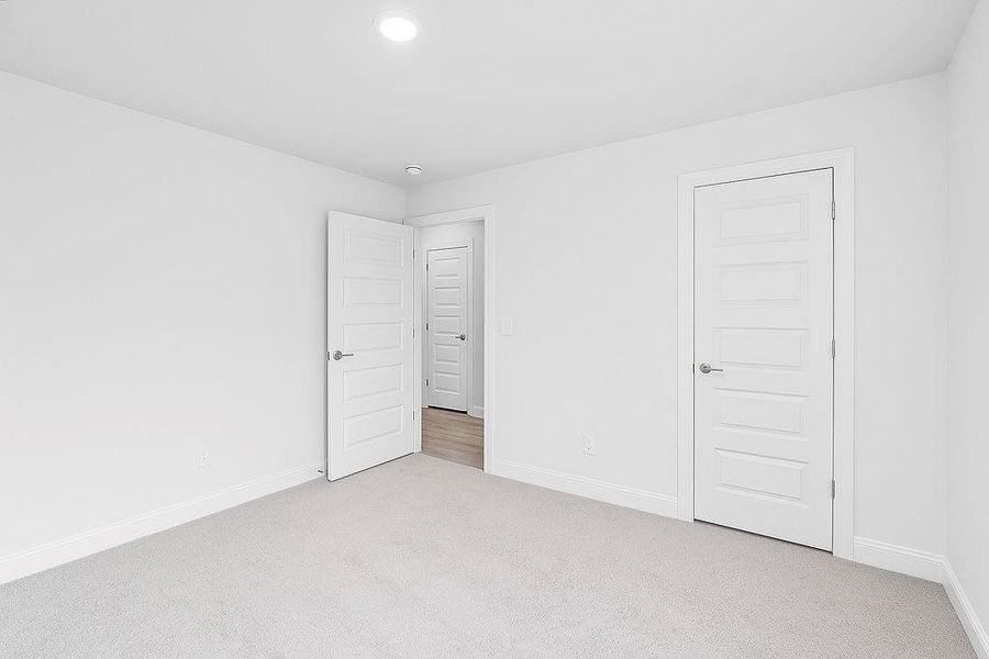 Spacious, unfurnished interior of a new home in Waters Edge, Mansfield (Image 30).