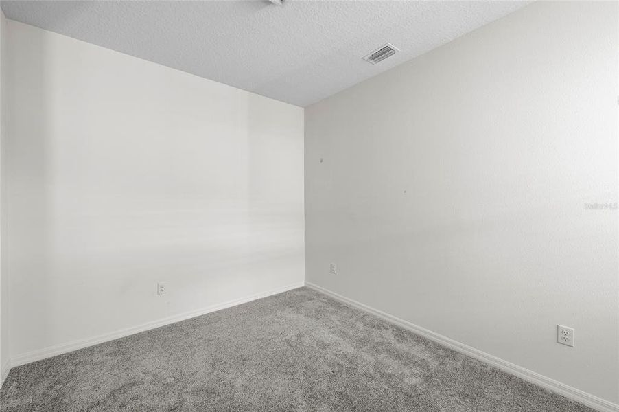 Spacious, unfurnished interior of a new home in Heron Bay, Palmetto (Image 31). Spacious, unfurnished interior of a new home in Heron Bay, Palmetto (Image 31).