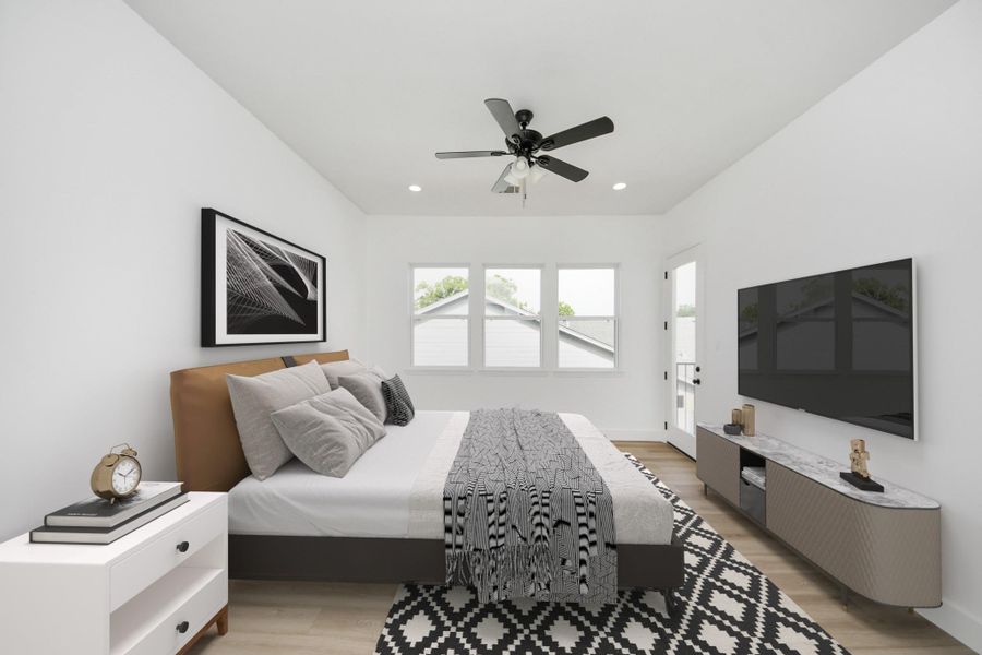 Spacious primary bedroom w/ natural light. Spacious primary bedroom w/ natural light.