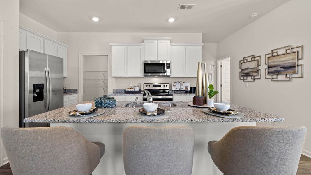 Representative furnished interior of a home built from the Robie by D.R. Horton in Kingston Ranch at Lake Oconee, Buckhead (Image 7).