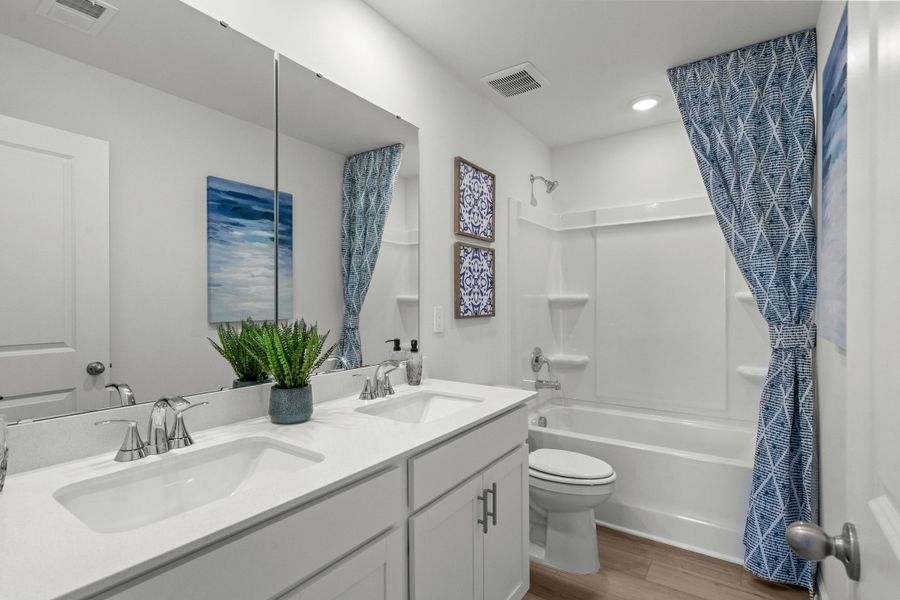 Furnished interior view inside a new home in Waterside - Boardwalk Series, Longs (Image 13). Furnished interior view inside a new home in Waterside - Boardwalk Series, Longs (Image 13).