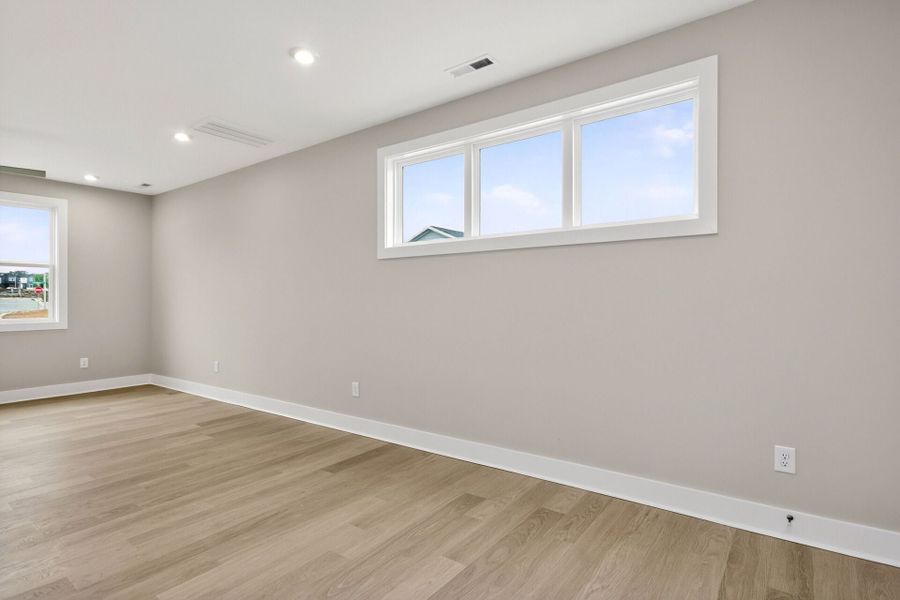 Representative unfurnished interior of a home built from the Ember B by Homes by Dickerson in Chatham Park, Pittsboro (Image 11).