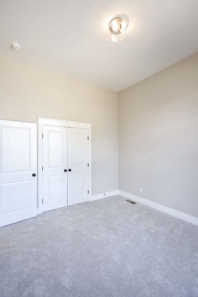 Spacious, unfurnished interior of a new home in Baker Road, Birchwood (Image 45).