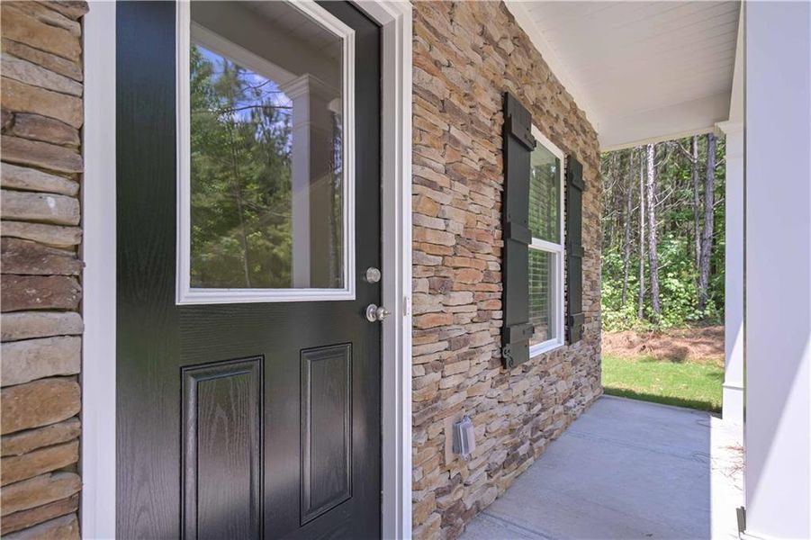 Front exterior of a new home in , Villa Rica, GA, highlighting curb appeal (Image 12).