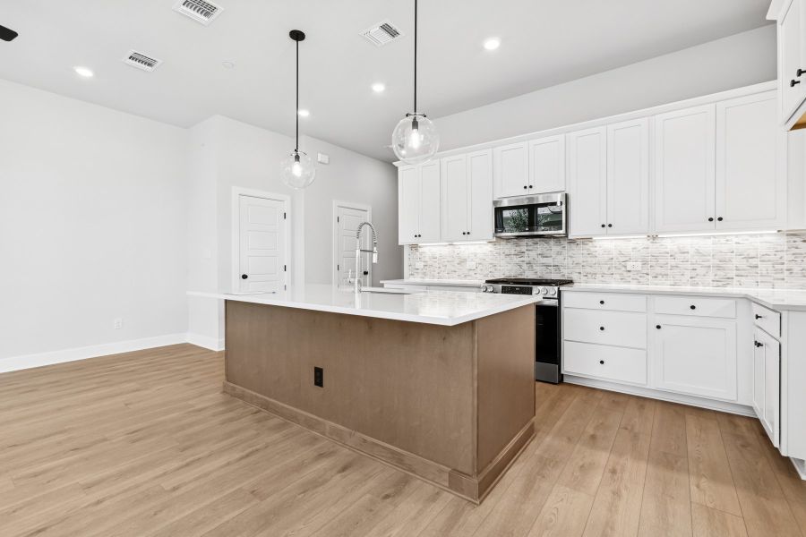 Furnished interior view inside a new home in Double Creek Crossing – City Home Series, Round Rock (Image 6). Furnished interior view inside a new home in Double Creek Crossing – City Home Series, Round Rock (Image 6).