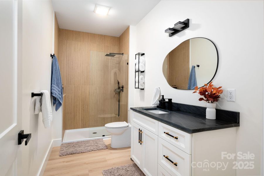Full Bathroom on Main Level with Beautiful Tile Walk-in Shower