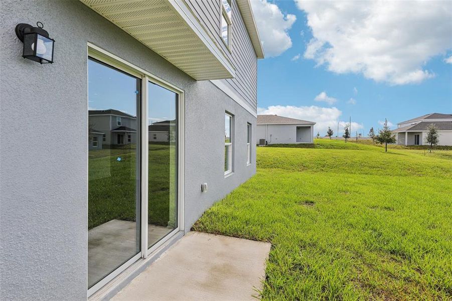 Exterior details and patio area of a home in Bradbury Creek, Haines City (Image 3).