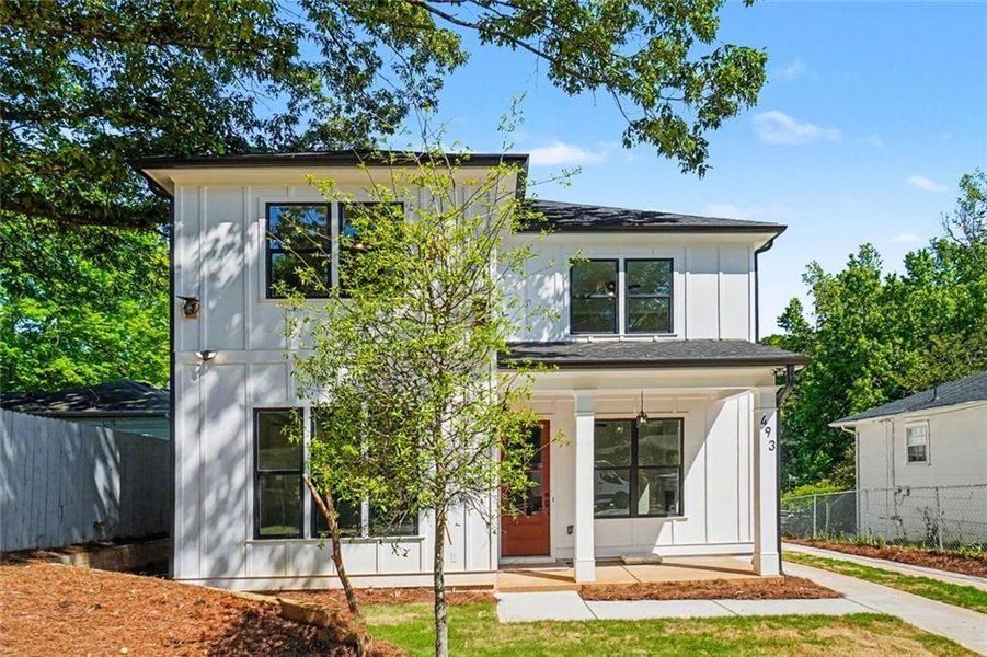 Front exterior of a new home in , Hapeville, GA, highlighting curb appeal (Image 1). Front exterior of a new home in , Hapeville, GA, highlighting curb appeal (Image 1).