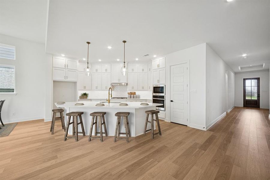 Furnished interior view inside a new home in Pecan Square - Gardens, Northlake (Image 10).