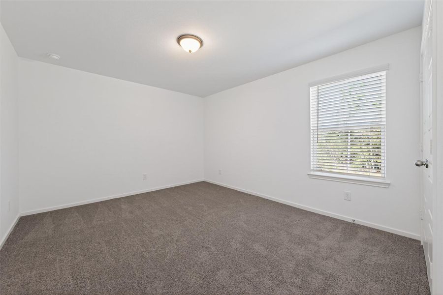 Spacious, unfurnished interior of a new home in Enclave at Willis, Willis (Image 36).