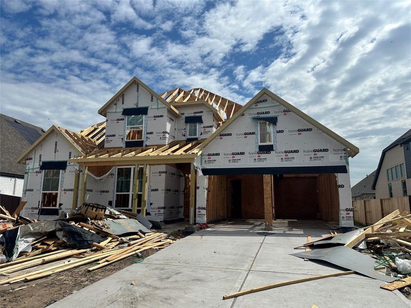 In-progress construction of a new home in Meridiana, Manvel, TX (Image 21).