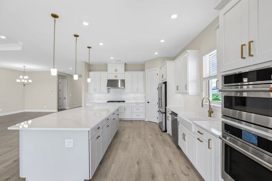 Furnished interior view inside a new home in Esplanade at Starling, Punta Gorda (Image 9). Furnished interior view inside a new home in Esplanade at Starling, Punta Gorda (Image 9).