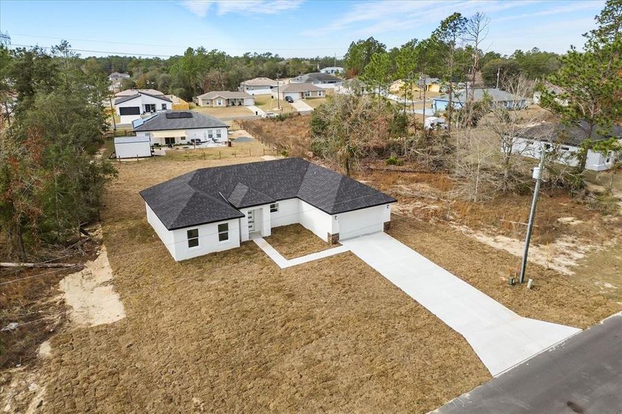 Front exterior of a new home in , Ocala, FL, highlighting curb appeal (Image 20).
