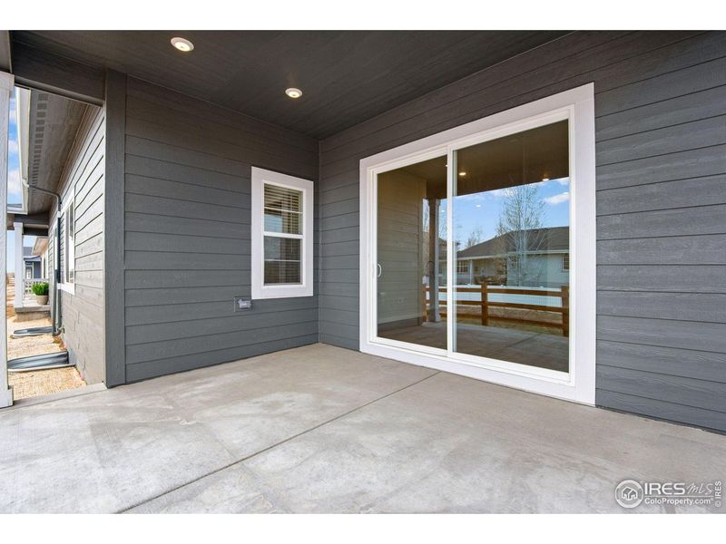 Exterior details and patio area of a home in Westside Crossing, Berthoud (Image 3).