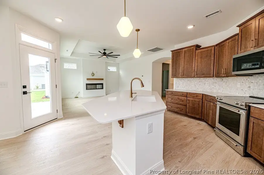 Furnished interior view inside a new home in The Cottages at 78 North, Sanford (Image 11). Furnished interior view inside a new home in The Cottages at 78 North, Sanford (Image 11).
