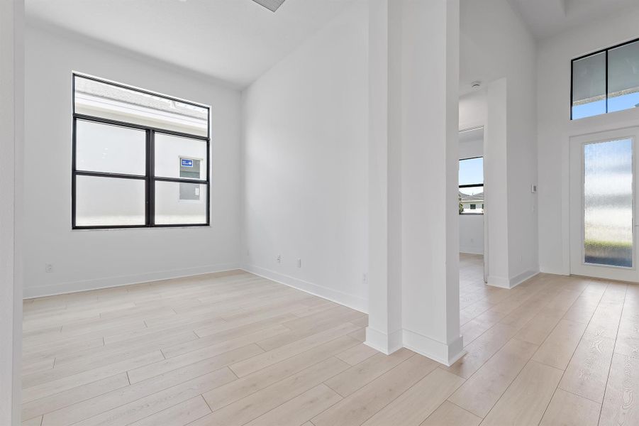 Spacious, unfurnished interior of a new home in Cove Royale, Stuart (Image 34).